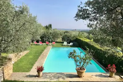 Image de Maison de famille panoramique Chianti, 5 chambres, piscine, clim, WiFi, borne Ve