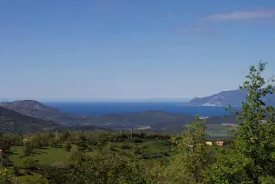Image de Entre mer et montagne maison et jardin. avec vue sur St Florent et le Cap Corse,
