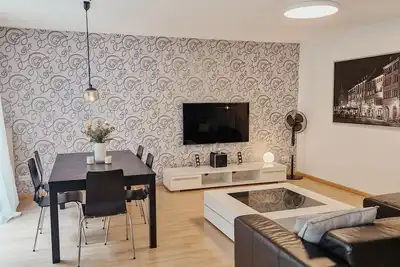 Image de Appartement super central avec Tv satellite et WiFi