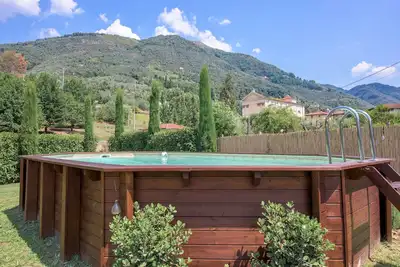Image de Villa à Camaiore 4 chambres doubles - jardin - piscine chauffée- Air Co - Wifi.
