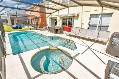 Image de 7 Bdrm face au lac w à 10 min de Disney, sur le lac, piscine privée