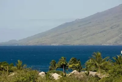 Image de Vue sur l'océan / la montagne au dernier étage avec grande véranda