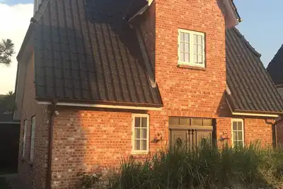 Image de Fantastique! Proche de la plage, Friesenhaus haut de gamme équipée avec sauna