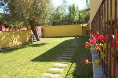 Image de Villa Delfina Rosa 350 mt de la plage. Maison Romantique Et Familiale.