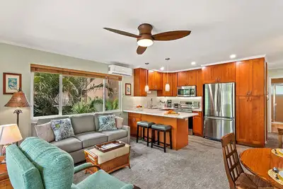 Image de Vue sur le jardin tropical dans une propriété en bord de plage-Kihei Kai Unit 21