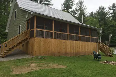 Image de Détente pittoresque Adirondack maison sur le lac noir dans les 1000 îles