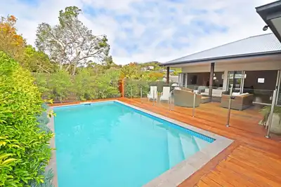Image de Maison neuve à la plage avec piscine chauffée solaire