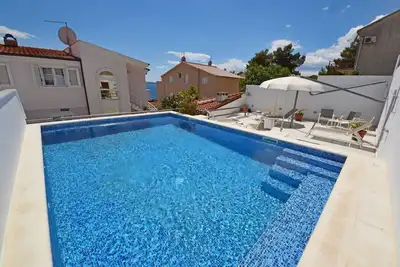 Image de Confortable appartement avec climatisation, piscine, Wifi, Tv, terrasse, animaux admis et parking
