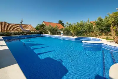 Image de Joli appartement pour 3 personnes avec piscine, Wifi, climatisation, Tv et terrasse