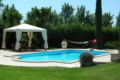 Image de Appartement dans une villa, grand jardin, piscine, spa, près de la mer de Rome