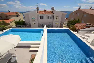 Image de Agréable appartement avec Wifi, climatisation, piscine, Tv, terrasse, animaux admis et parking