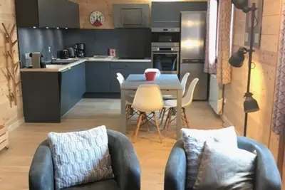 Image de 2 chambres, 50 m² Alpe d'Huez hyper-centre, départ et retour skis aux pieds