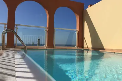 Image de Appartement de luxe, Wifi, vue sur le phare et la plage, piscine privée