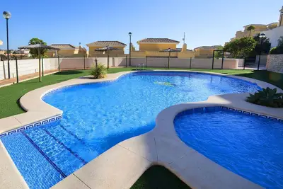 Image de Bel appartement pour 6 personnes avec climatisation, Wifi, piscine, Tv, terrasse et parking