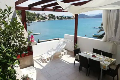 Image de Appartement Olly en front de mer grande terrasse avec barbecue 4 transats et jardin