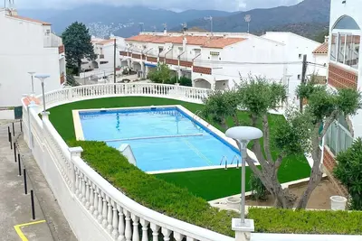 Image de A38-Casa adosada con parking, pisicna y Wi-fi