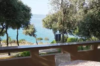 Image de Appartement de deux chambres avec la terrasse et la vue sur le mer Baie Mulobedanj, Pag (A-16285-a)