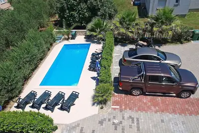 Image de Agréable appartement pour 4 personnes avec Wifi, climatisation, piscine, Tv et terrasse