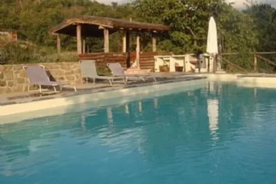 Image de Villa toscane avec piscine privée et vue imprenable pouvant accueillir jusqu'à 11 personnes