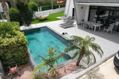 Image de Maison de vacances de luxe design, piscine chauffée (12 mois). 200m jusqu'à la prochaine baie.