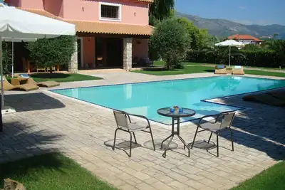 Image de Luxueuse villa de plage : à 15 minutes à pied de la plage, avec une immense pisc