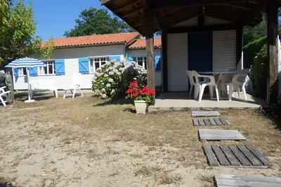 Image de Mimizan Plage 800 m plage, 5km lac, jolie maison bois bien équipée, plain pied.