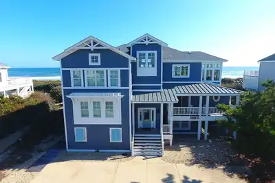 Image de Oceanfront Corolla-11 Bdr (8 Mstr) Pool, Fire Pit, Steps to beach, Remodeled 2019!