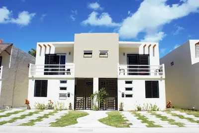 Image de Magnifique condo dans une communauté sécurisée! Proche de Cancun! 5 min en voiture de la plage!