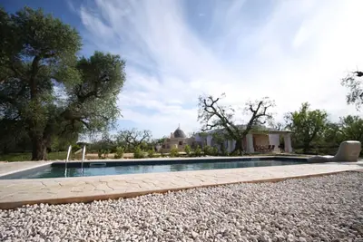 Image de Trullo Sunrise avec piscine d'eau salée