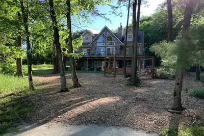 Image de Accueil lac magnifique, Près des pistes de ski, Cheminée, Bain à remous, Foyer, Bateaux