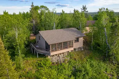 Image de Trois chambre cabine 20 Miles Ne de Ely Avec une exquise Vue De La Bwcaw