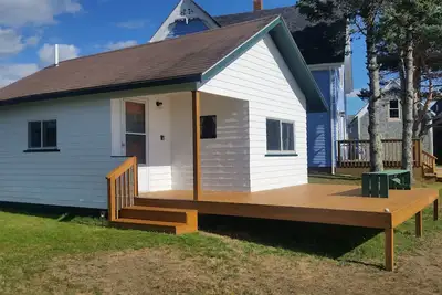 Image de Primrose Seaside Cottage au-dessus du rivage avec des vues magnifiques