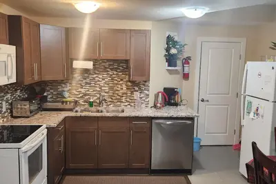 Image de Suite de luxe 2 chambres au sous-sol - maison et à l'extérieur