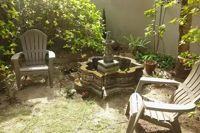 Image de Tropical Garden 2 Bedroom Apt. Dans Beach House