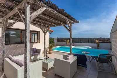Image de Appartement de 70 m² + terrasse de 40 m² + piscine à usage exclusif + Internet Wi Fi