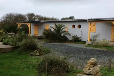Location chalets bois à 500 mêtres des plages et des vagues