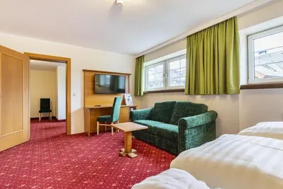 Image de Chambre Familiale Confort - Romantik Hotel Wastlwirt ****