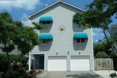 Image de A Caribbean Fantasy - Luxe / Confort / Style / Piscine / Bar Cabana - près de Boardwalk