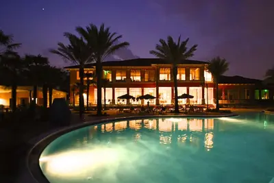 Image de Belle 1900 sq 4bedroom, 3 Mi à Disney, 1 min à pied de la piscine / toboggan, WiFi gratuit