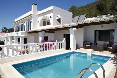 Image de Maison avec vue sur la mer et piscine, près de Playa den Bossa et Ibiza