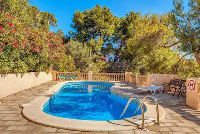 Image de Appartement climatisé avec vue sur la mer, piscine partagée et Wi-Fi