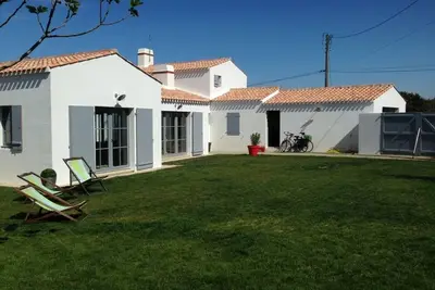 Image de Maison neuve  avec jardin à 300m de la plage et 200 m du port et des commerces