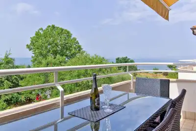 Image de Appartement de vacances avec air conditionné et balcon