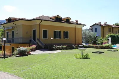 Image de Apartment in villa + large garden with beach and golf at 50 mt