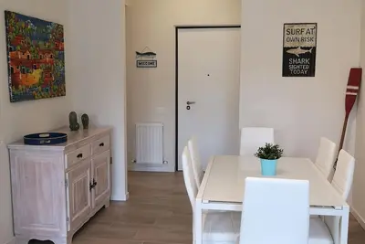 Image de Appartement neuf et accueillant à quelques pas de la mer avec grand jardin