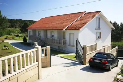 Image de Jardin privé, en bord de mer, vue sur la mer