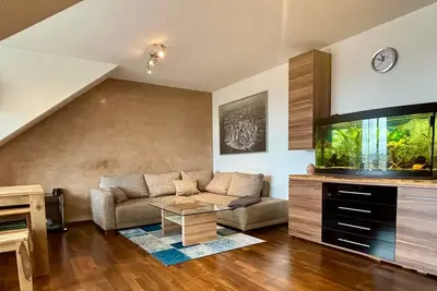 Image de 85 m² Appartement mansardé-Therme, aéroport, exposition