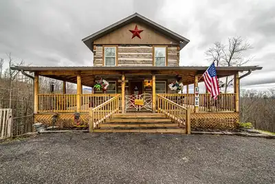 Image de Authentic Antique Log Cabin SITUÉ Dans La COMMUNAUTÉ De Timberidge