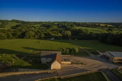 Image de Goose Run Cottage est caché dans un magnifique domaine familial privé de 70 acres.