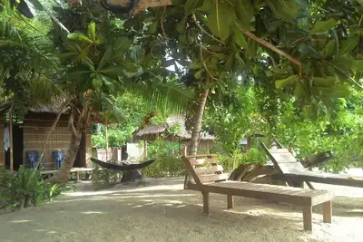 Notre Bungalow est situé en face plage de sable blanc intégré Avec The Jungle